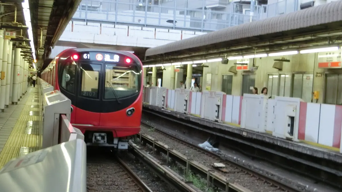 Tokyo Metro Marunouchi Line 2000 series train departing from Myogadani Station