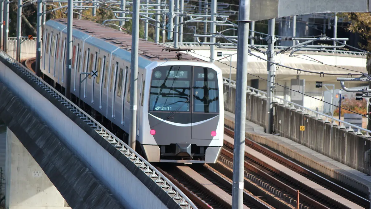 Sendai Municipal Subway Tozai Line 2000 series train departing from Kokusai Center Station