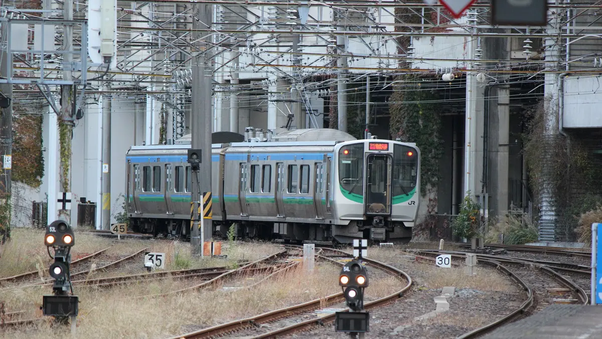 Sendai Airport Line E721 series train departing from Sendai Station
