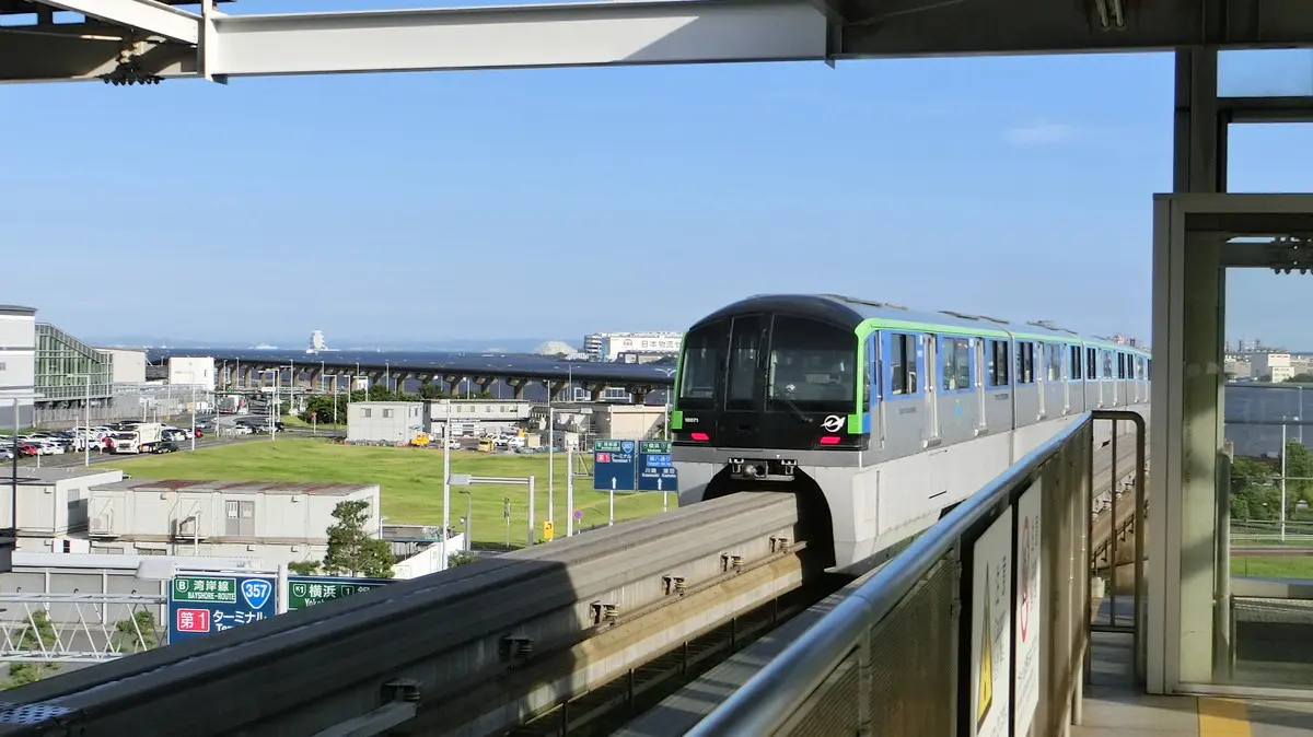 Tokyo Monorail 2000 series train departing from Haneda Airport Terminal 3 Station